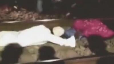 The man, who saved the woman, was later identified as Mohammad Mehboob, a 36-year-old carpenter. (Video grab) The man, who saved the woman, was later identified as Mohammad Mehboob, a 36-year-old carpenter. (Video grab)