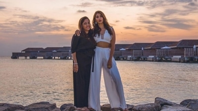 Pooja teamed the cropped blouse with high-waisted linen pants featuring a flared hem and pleated front. She styled the all-white ensemble with star-shaped silver earrings, rings, tan peep-toe sandals, and a white flower accessory adorned in her tresses. (Instagram/@hegdepooja) Pooja teamed the cropped blouse with high-waisted linen pants featuring a flared hem and pleated front. She styled the all-white ensemble with star-shaped silver earrings, rings, tan peep-toe sandals, and a white flower accessory adorned in her tresses. (Instagram/@hegdepooja)