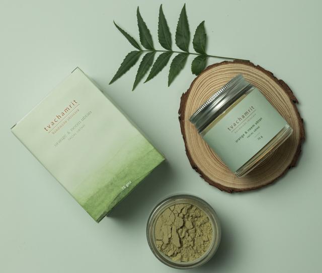 The Orange & Neem handmade facial ubtan by TVACHAMRIT has anti-microbial and anti-inflammatory properties which help in soothing irritated and acne-prone skin. The Orange & Neem handmade facial ubtan by TVACHAMRIT has anti-microbial and anti-inflammatory properties which help in soothing irritated and acne-prone skin.