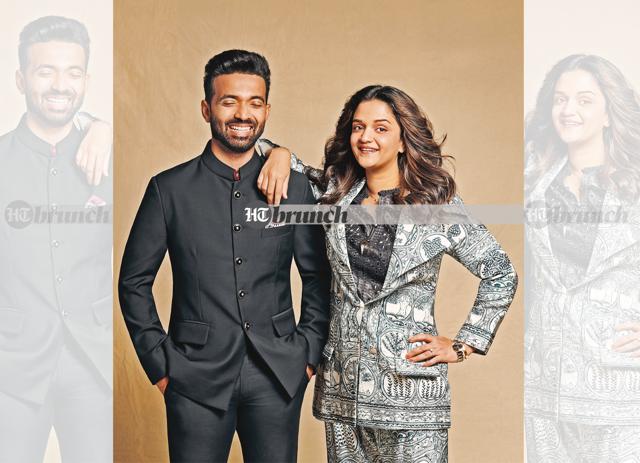 Ajinkya says he had always maintained that the game and country come first. But, spending the seven months during the pandemic with Aarya [the couple’s two-year-old daughter] made him a happier, more confident person; On Ajinkya: Bandhgala, trousers & pocket square—all by Raghvendra Rathore;Shoes by Woods;Watch by Rolex (Ajinkya’s own); On Radhika: Jacket & pants by Aarti Vijay Gupta; Top and shoes by Zara