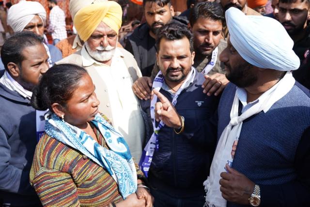 AAP candidate Kulwant Singh meeting voters in Mohali on Saturday. (HT Photo) AAP candidate Kulwant Singh meeting voters in Mohali on Saturday. (HT Photo)