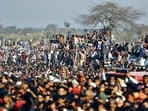 Supporters gather at an election rally addressed by Uttar Pradesh chief minister Yogi Adityanath and Indian Prime Minister Narendra Modi ahead of state elections in Kasganj, Uttar Pradesh, India, Friday, February 11, 2022. (AP Photo/Rajesh Kumar Singh) Supporters gather at an election rally addressed by Uttar Pradesh chief minister Yogi Adityanath and Indian Prime Minister Narendra Modi ahead of state elections in Kasganj, Uttar Pradesh, India, Friday, February 11, 2022. (AP Photo/Rajesh Kumar Singh)