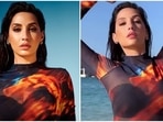 Nora Fatehi sets Dubai on fire in <span class='webrupee'>₹</span>4k printed see-through dress for beachside shoot: Pics and video Nora Fatehi sets Dubai on fire in <span class='webrupee'>₹</span>4k printed see-through dress for beachside shoot: Pics and video