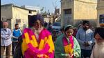 The chief of Shiromani Akali Dal (Amritsar), Simranjit Singh Mann, with actress Sonia Mann during a poll campaign for the Punjab assembly elections, in the Amargarh constituency. (HT Photo)