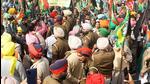 Police personnel stop farmers during a protest against Union home minister Amit Shah’s visit, in Patiala on Sunday. (ANI Photo)
