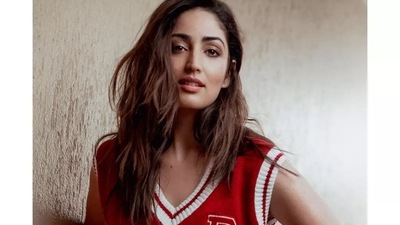 Taking to her social media handle, Yami shared a slew of pictures featuring her donning a red sleeveless pullover that came with a V-neckline and contrasting white stripes. (Instagram/yamigautam) Taking to her social media handle, Yami shared a slew of pictures featuring her donning a red sleeveless pullover that came with a V-neckline and contrasting white stripes. (Instagram/yamigautam)