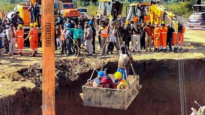 The rescue operation by a joint team of NDRF and SDRF has been underway for the past 15 hours as two labourers are still trapped in the tunnel. (PTI Photo)