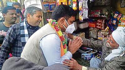 Former Kanpur police commissioner Asim Arun speaks to an elderly man during the campaign for the UP polls in Kannauj Sadar. (HT Correspondent) Former Kanpur police commissioner Asim Arun speaks to an elderly man during the campaign for the UP polls in Kannauj Sadar. (HT Correspondent)
