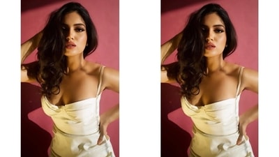 Bhumi chose a pristine white maxi dress that screamed elegance and feminine vibes. It features barely-there spaghetti straps, a corseted bodice, a plunging sweetheart neckline with gathered elements, cinched detail on the waist, a bodycon silhouette that accentuated the star's curves, and a risqué thigh-high slit on the side. (Instagram/@bhumipednekar) Bhumi chose a pristine white maxi dress that screamed elegance and feminine vibes. It features barely-there spaghetti straps, a corseted bodice, a plunging sweetheart neckline with gathered elements, cinched detail on the waist, a bodycon silhouette that accentuated the star's curves, and a risqué thigh-high slit on the side. (Instagram/@bhumipednekar)