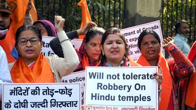 United Hindu Front supporters hold placards as they stage a protest against the recent alleged break-in at a Hindu temple in Canada, at Chanakyapuri Police Station, in New Delhi on Thursday. (Ishant) United Hindu Front supporters hold placards as they stage a protest against the recent alleged break-in at a Hindu temple in Canada, at Chanakyapuri Police Station, in New Delhi on Thursday. (Ishant)