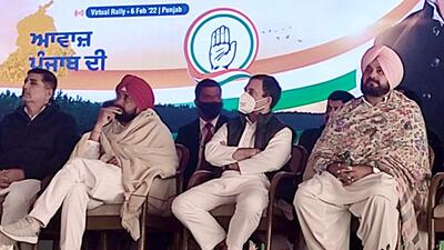 Congress CM candidate for Punjab assembly elections Charanjit Singh Channi with Punjab Congress chief Navjot Singh Sidhu and party leader Rahul Gandhi at the virtual rally, in Ludhiana. (ANI) Congress CM candidate for Punjab assembly elections Charanjit Singh Channi with Punjab Congress chief Navjot Singh Sidhu and party leader Rahul Gandhi at the virtual rally, in Ludhiana. (ANI)