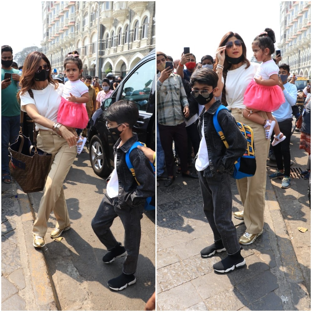 Shilpa Shetty was seen wearing a white T-shirt with light brown coloured trousers, matching sneakers.