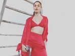 Taking the obsession with red on Valentine's Day up a notch, South African model and designer Gabriella Demetriades brushed aside our Monday blues with her recent viral pictures in a sizzling red bralette, pant and shirt for dinner date.  (Instagram/gabriellademetriades)