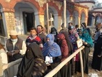UP Election 2022 Latest News: Voters stand in queue to cast votes in Bijnor booth amid the second phase of assembly elections in Uttar Pradesh.(HT Photo/S Raju)