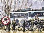 Security personnel carry out the rescue and relief works at the site of suicide bomb attack in the Pulwama district of south Kashmir.
