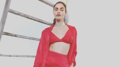 Taking the obsession with red on Valentine's Day up a notch, South African model and designer Gabriella Demetriades brushed aside our Monday blues with her recent viral pictures in a sizzling red bralette, pant and shirt for dinner date. (Instagram/gabriellademetriades) Taking the obsession with red on Valentine's Day up a notch, South African model and designer Gabriella Demetriades brushed aside our Monday blues with her recent viral pictures in a sizzling red bralette, pant and shirt for dinner date. (Instagram/gabriellademetriades)