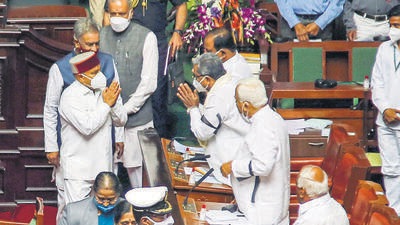 Karnataka Governor Thaawarchand Gehlot greets Opposition leaders after addressing the joint session of Karnataka Assembly, during the first day of Karnataka Assembly session, at Vidhanasoudha in Bengaluru on Monday. (PTI) Karnataka Governor Thaawarchand Gehlot greets Opposition leaders after addressing the joint session of Karnataka Assembly, during the first day of Karnataka Assembly session, at Vidhanasoudha in Bengaluru on Monday. (PTI)