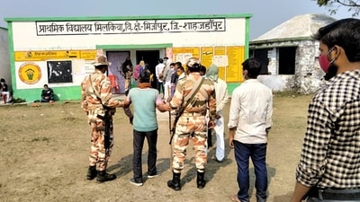 Indo-Tibetan Border Police (ITBP) personnel assist a specially-abled voter to reach the polling booth during the second phase of Uttar Pradesh Assembly elections in Shahjahanpur. (ANI) Indo-Tibetan Border Police (ITBP) personnel assist a specially-abled voter to reach the polling booth during the second phase of Uttar Pradesh Assembly elections in Shahjahanpur. (ANI)