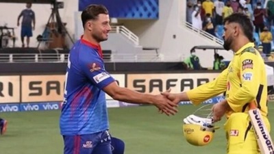 Marcus Stoinis and MS Dhoni (BCCI)