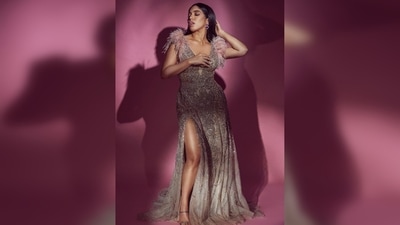 In the pictures, Bhumi Pednekar can be seen donning a gorgeous embellished thigh-high slit gown. (Instagram/@bhumipednekar) In the pictures, Bhumi Pednekar can be seen donning a gorgeous embellished thigh-high slit gown. (Instagram/@bhumipednekar)