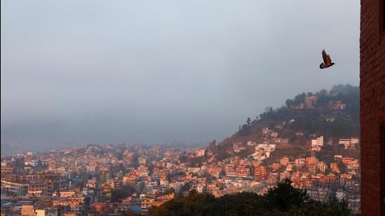 Sunlight illuminates a part of Kathmandu valley in Nepal on February 6, 2022. (REUTERS)