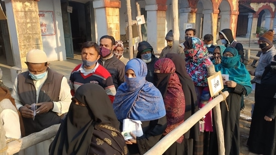 UP Election 2022 Latest News: Voters stand in queue to cast votes in Bijnor booth amid the second phase of assembly elections in Uttar Pradesh. UP Election 2022 Latest News: Voters stand in queue to cast votes in Bijnor booth amid the second phase of assembly elections in Uttar Pradesh.