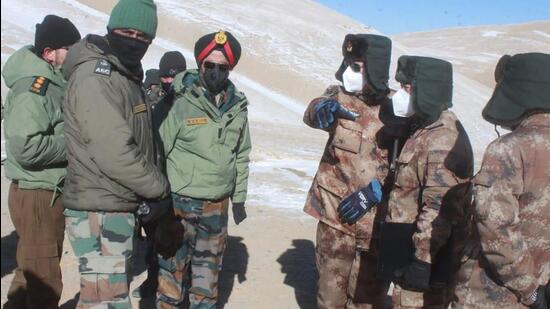Army officers of India and China hold a meeting at Pangong lake region in Ladakh on the India-China border on February 10. (AP)