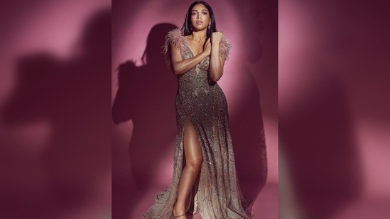 Bhumi Pednekar's outfit featured a plunging neckline, fringe sleeves, sequins work and a slit that went up till her thighs.(Instagram/@bhumipednekar)