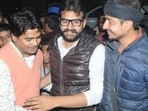 Abbas contested the 2017 assembly election from Ghosi as a BSP candidate and finished second to the BJP’s Fagu Chauhan. In picture - Abbas Ansari (centre), son of gangster-turned-politician Mukhtar Ansari, meets with voters.(HT File Photo)