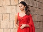 Suhana Khan in a bright red saree. Suhana Khan in a bright red saree.