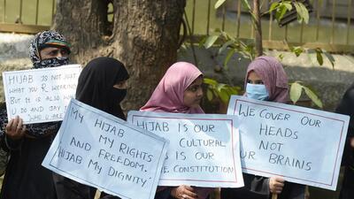 A three-Judge bench led by chief justice Ritu Raj Awasthi and justices J M Khazi and Krishna M Dixit, have been hearing multiple petitions filed in the matter. (AFP) A three-Judge bench led by chief justice Ritu Raj Awasthi and justices J M Khazi and Krishna M Dixit, have been hearing multiple petitions filed in the matter. (AFP)