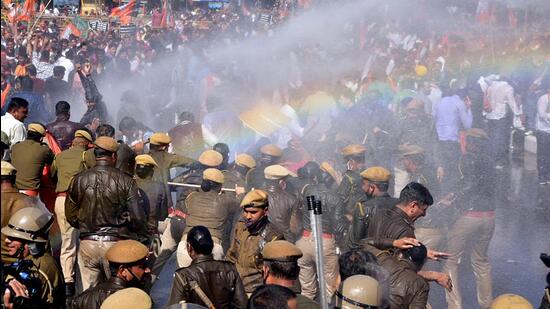 The police resorted to water cannons to disburse the BJP activists, who forcefully tried crossing the barricades (ANI Photo)