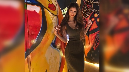 Suhana Khan made jaws drop and heads turn as she posed in a black ribbed bodycon dress with her long luscious hair open.(Instagram/@suhanakhan2)