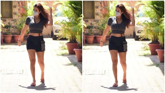 All masked up, Malaika posed for the camera.(HT Photos/Varinder Chawla)