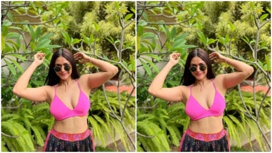 In bright colours, Mrunal matched her state of mind with her attire as posed in her resort's garden for pictures.(Instagram/@mrunalthakur)