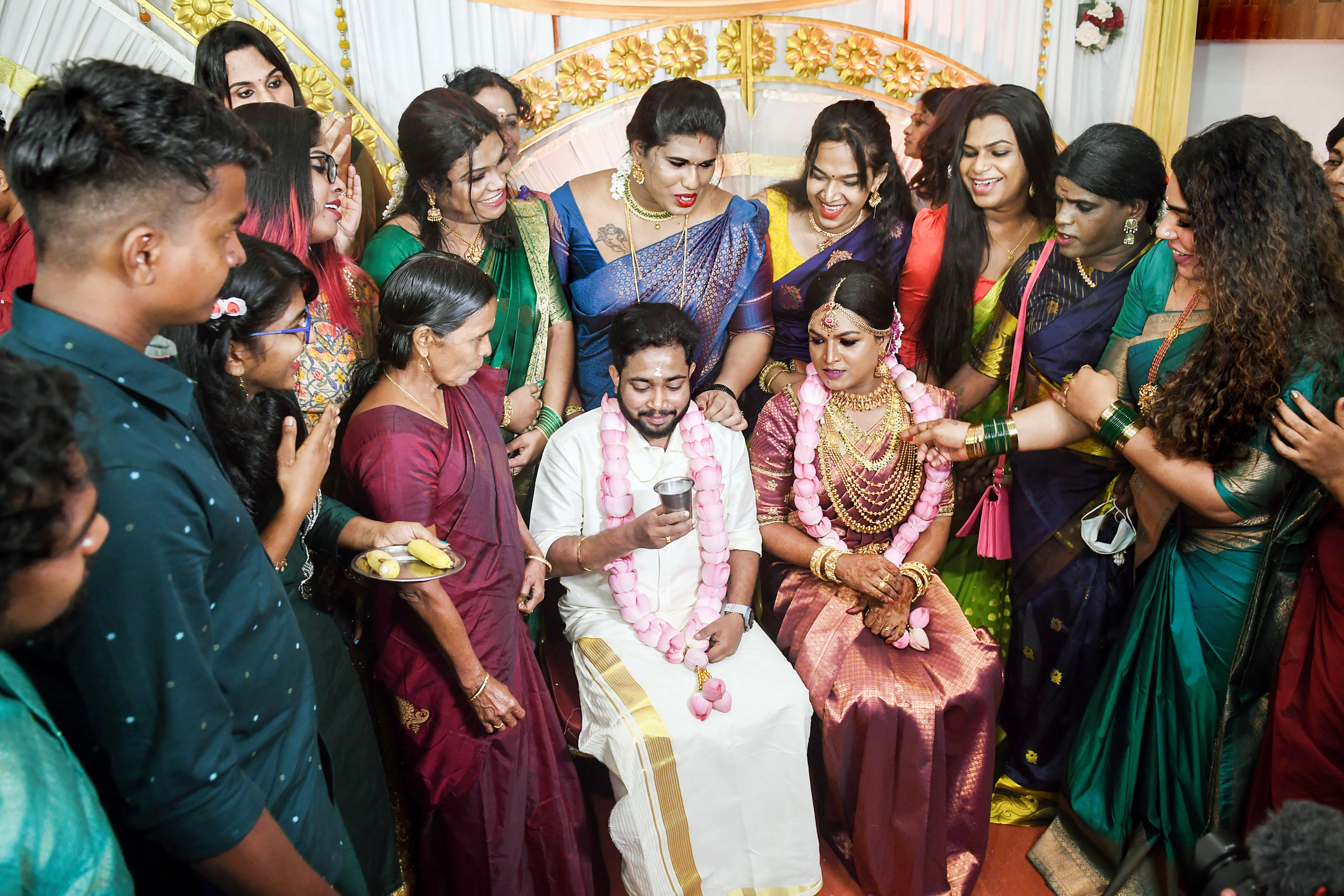 Transgender couple Syama S. Prabha and Manu Karthika perform rituals during their wedding ceremony, on Valentine's Day, in Thiruvananthapuram. (PTI) Transgender couple Syama S. Prabha and Manu Karthika perform rituals during their wedding ceremony, on Valentine's Day, in Thiruvananthapuram. (PTI)