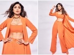The gorgeous Shilpa Shetty never fails to impress the fashion police with her perfectly styled outfits. In her recent stills, the actor can be seen donning a tangerine co-ord set.(Instagram/@mohitvaru)