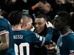 PSG's Kylian Mbappe, second right, celebrates with teammates after scoring his side's opening goal during the Champions League, round of 16, first leg soccer match between Paris Saint Germain and Real Madrid at the Parc des Princes stadium, in Paris, France. PSG's Kylian Mbappe, second right, celebrates with teammates after scoring his side's opening goal during the Champions League, round of 16, first leg soccer match between Paris Saint Germain and Real Madrid at the Parc des Princes stadium, in Paris, France.