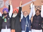PM Narendra Modi with party leaders and candidates during a rally in Pathankot on Wednesday.&nbsp;(Sameer Sehgal/HT Photo)