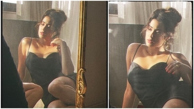 Janhvi Kapoor played with the rays of the sun and captured some stunning aesthetic pictures of herself in a short strappy black dress. (Instagram/@janhvikapoor) Janhvi Kapoor played with the rays of the sun and captured some stunning aesthetic pictures of herself in a short strappy black dress. (Instagram/@janhvikapoor)