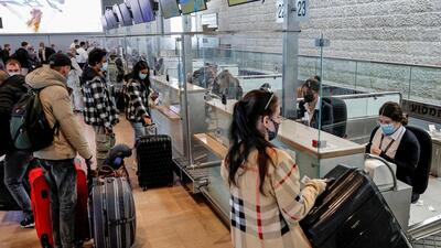 Travellers wait at the check-in counter ahead of their Ukraine International Airlines flight to Kyiv at Israel's Ben Gurion airport in Lod near Tel Aviv on Sunday. (AFP) Travellers wait at the check-in counter ahead of their Ukraine International Airlines flight to Kyiv at Israel's Ben Gurion airport in Lod near Tel Aviv on Sunday. (AFP)