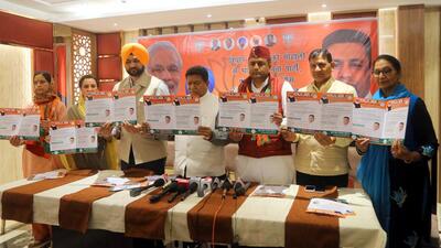 BJP candidate Sanjeev Vashisht (third from right), along with party leaders, releasing the party’s manifesto in Mohali ahead of the Punjab assembly elections. (HT Photo)