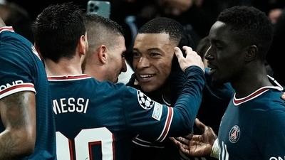 PSG's Kylian Mbappe, second right, celebrates with teammates after scoring his side's opening goal during the Champions League, round of 16, first leg soccer match between Paris Saint Germain and Real Madrid at the Parc des Princes stadium, in Paris, France. (AP) PSG's Kylian Mbappe, second right, celebrates with teammates after scoring his side's opening goal during the Champions League, round of 16, first leg soccer match between Paris Saint Germain and Real Madrid at the Parc des Princes stadium, in Paris, France. (AP)