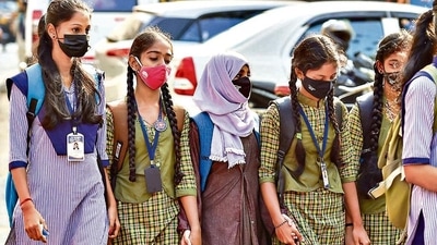 Students on way to their school in Udupi on Wednesday. (PTI) Students on way to their school in Udupi on Wednesday. (PTI)
