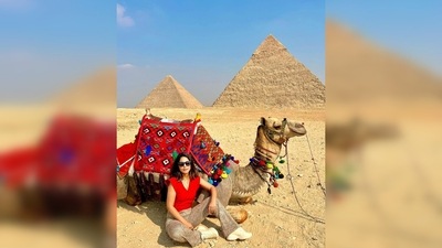 Hina Khan soaks in the sun as she sits next to a camel and enjoys the view. (Instagram/@realhinakhan)