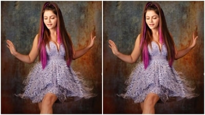 Assisted by hairstylist Sharda Jadhav, Rubina added pink hair extensions to her look and wore a part of her hair as a ponytail and left the rest of her tresses open. (Instagram/@rubinadilaik)