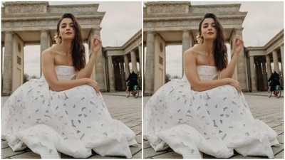 Alia's off-shoulder gown came with perforated details all over the body. The gown hugged her shape perfectly and showed off her curves. (Instagram/@aliaabhatt)