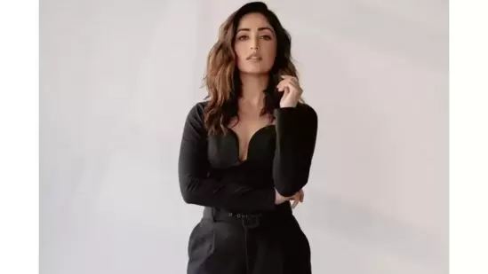 Earlier, Yami Gautam made heads turn as she posed in an all black look. She was seen donning a solid black bodysuit which she teamed with high-rise baggy trousers.(Instagram/@yamigautam)
