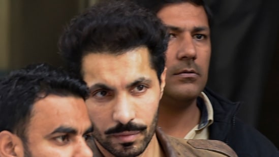 In this file image dated Tuesday, Feb. 9, 2021, deceased actor Deep Sidhu, being arrested by Delhi Police special cell in New Delhi.(PTI)