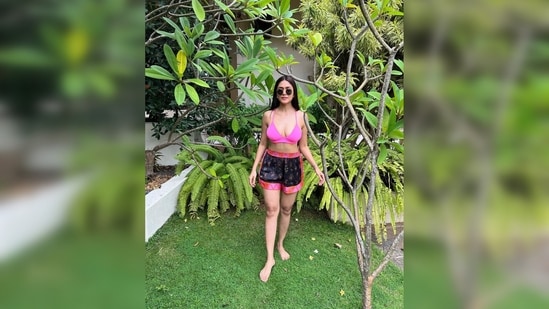 A few days ago, Mrunal Thakur set the internet on fire with her pictures clicked in Sri Lanka in a pink bralette and printed shorts.(Instagram/@mrunalthakur)